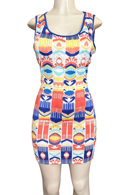 Colorful patterned dress on a mannequin against a white background
