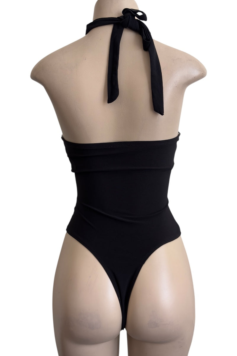 Black bodysuit on a mannequin with a white background