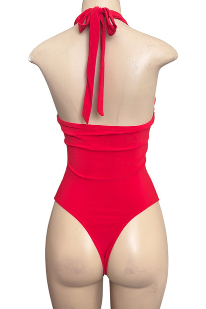 Red bodysuit on a mannequin with a white background