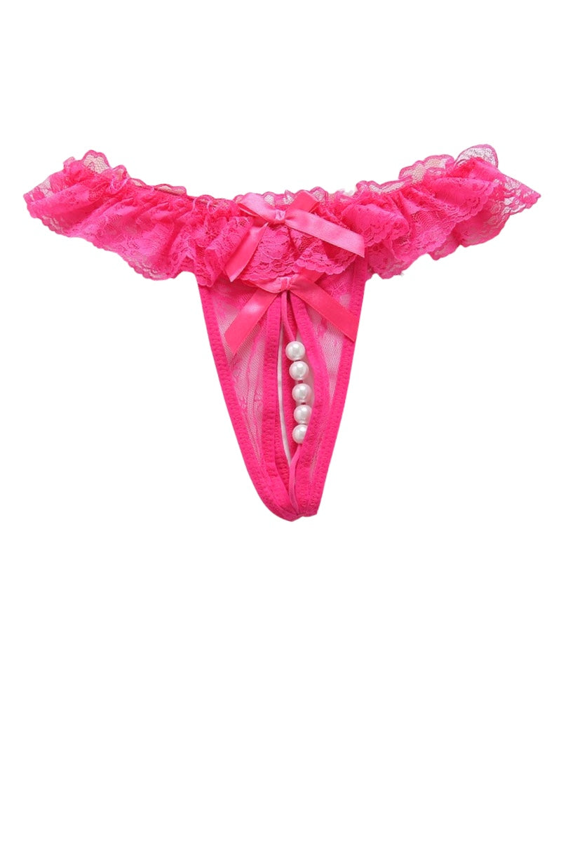 Bright hot pink lace thong with a ruffled waistband, sheer mesh front, and a vertical row of white faux pearls down the center, shown on a plain white background.