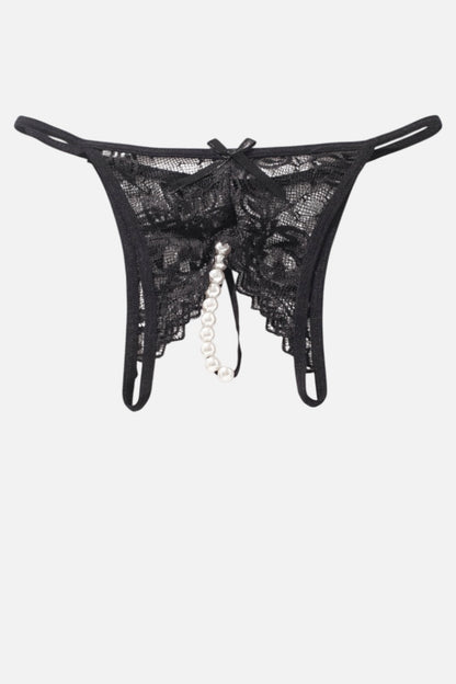 Black lace thong with a dangling pearl bead chain and bow detail, shown flat against a light gray background.