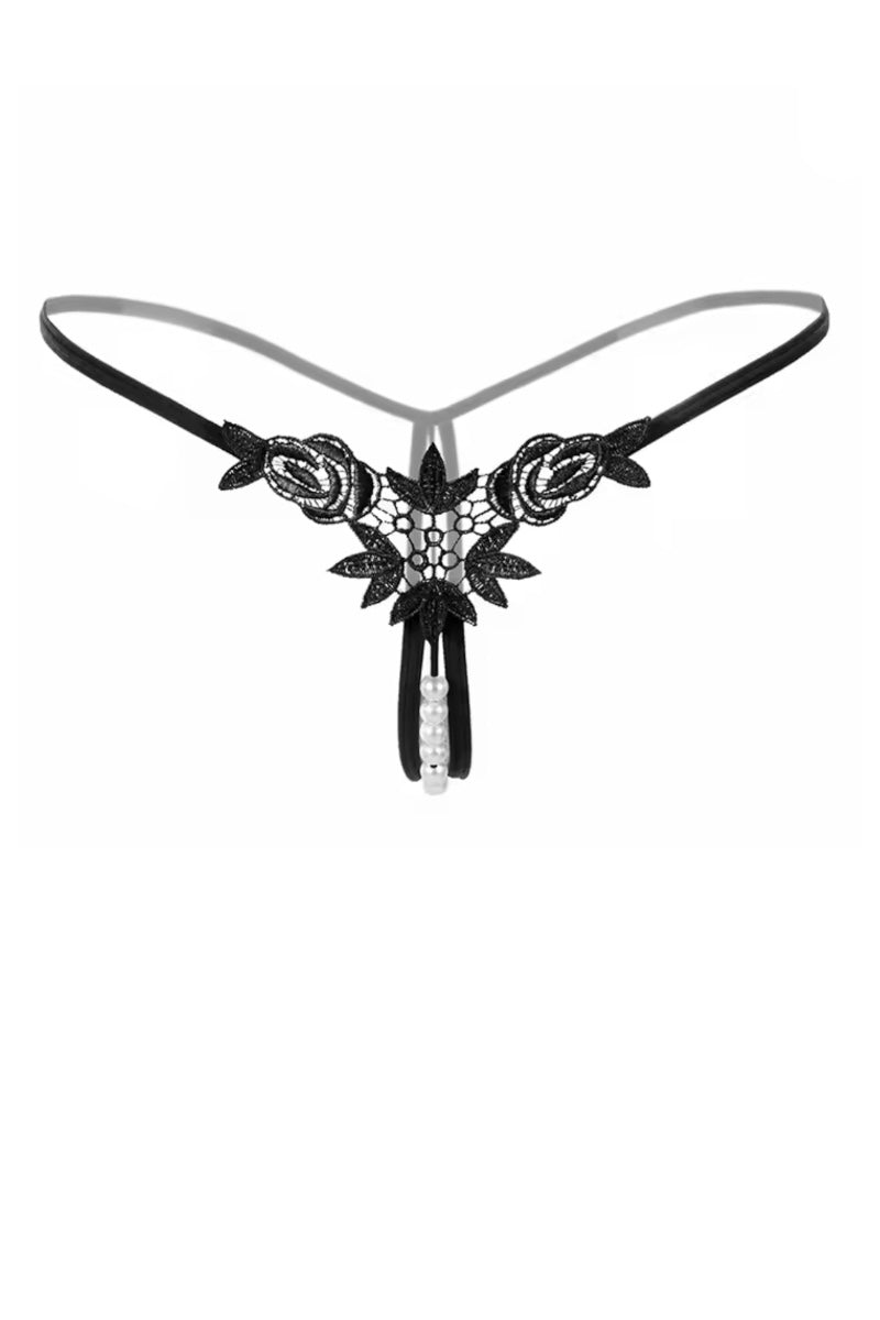Black floral thong with beads on a white background