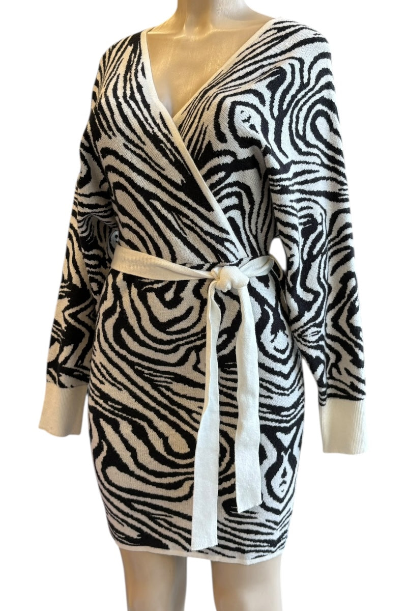 Zebra print dress with a belt on a mannequin against a white background
