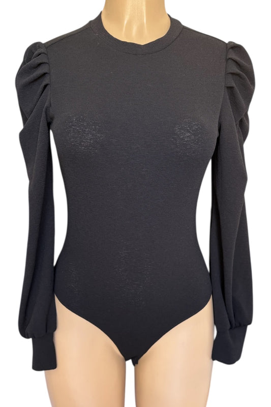Black bodysuit with puff sleeves on a mannequin against a white background