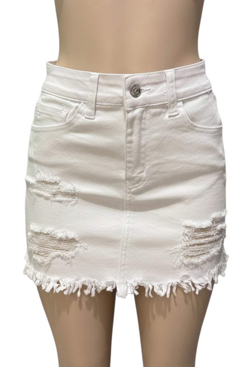 White denim skirt with frayed hem on a mannequin against a white background