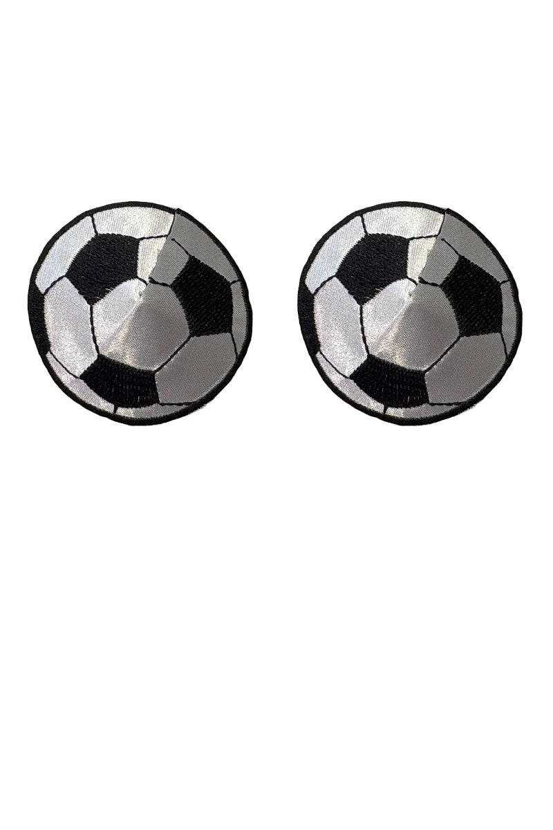 Pair of black and white soccer pasties on a white background