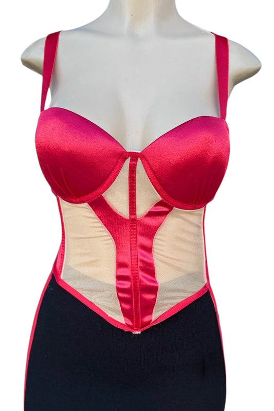 Red and beige top on a mannequin with a white background