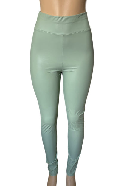 Mint green leggings on a white background
