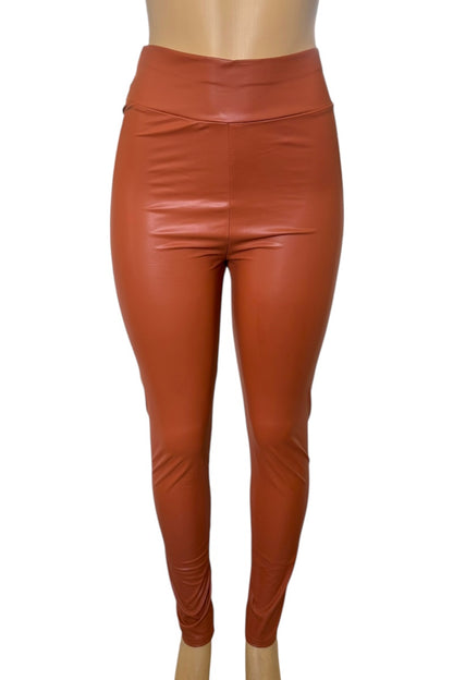 rust leather leggings on a white background