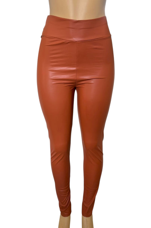rust leather leggings on a white background