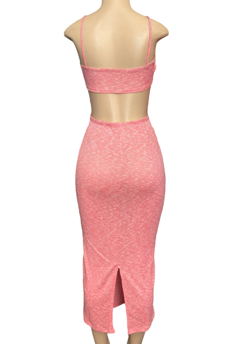 Pink dress on a mannequin against a white background