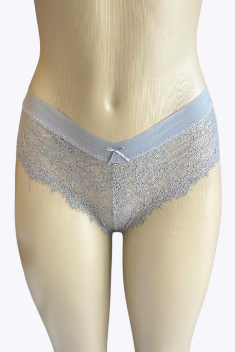 Grey lace underwear on a mannequin against a white background