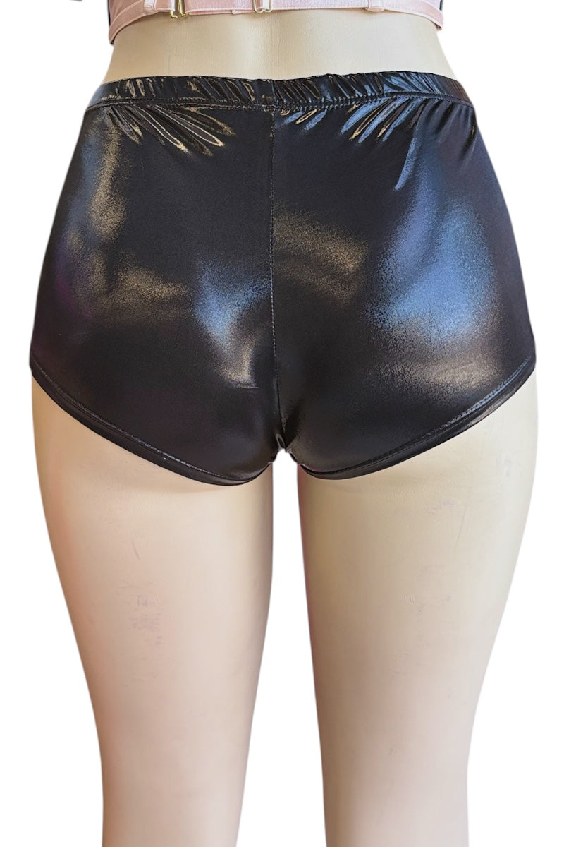 Black shiny shorts on a mannequin with a white background