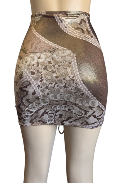 mini skirt on a mannequin against a white background