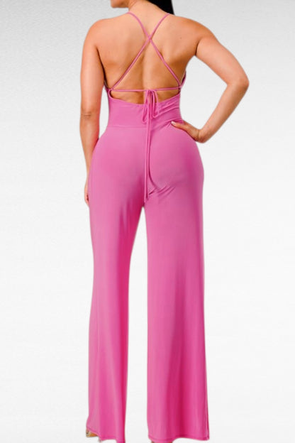 Pink jumpsuit with open back on a white background