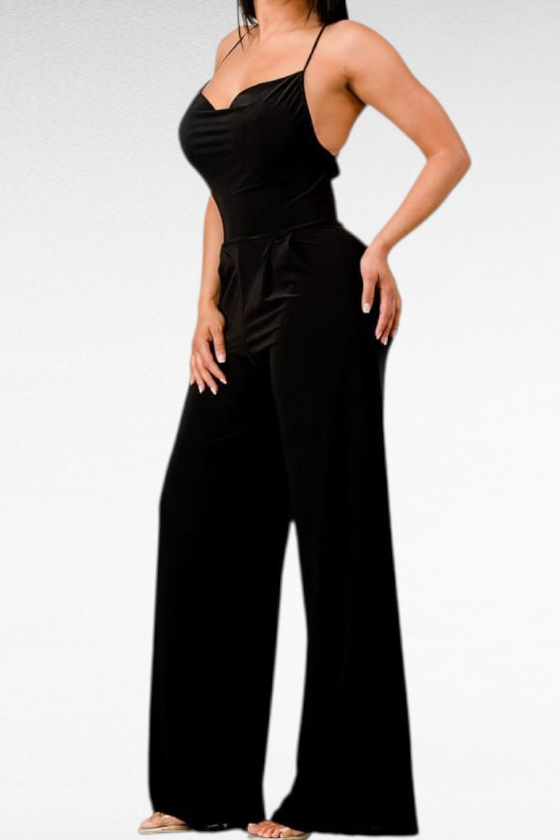 Black jumpsuit worn by a person on a white background