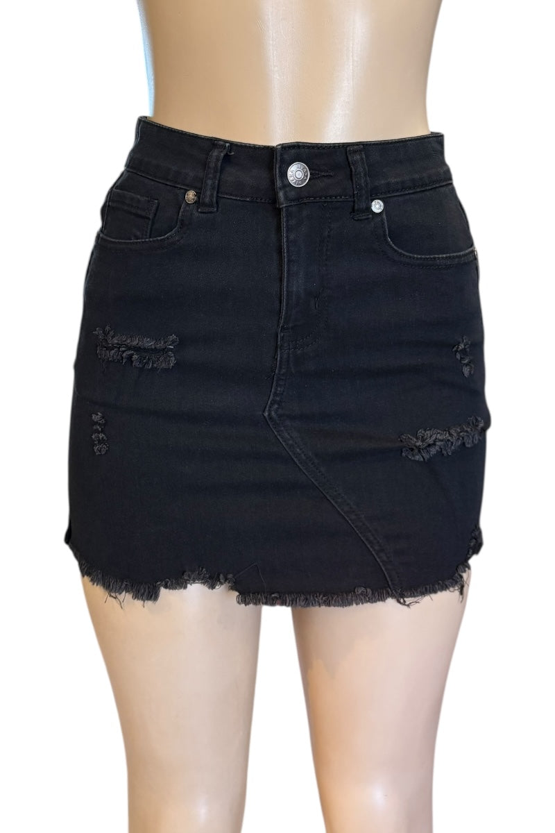 Black denim skirt on a mannequin with a white background