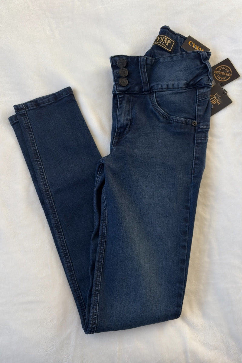 Pair of blue jeans with tags on a white background
