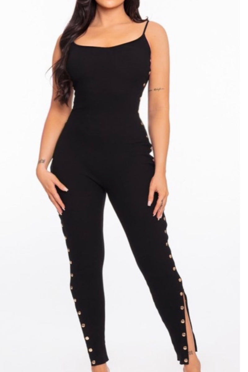 Black jumpsuit with gold accents on a white background