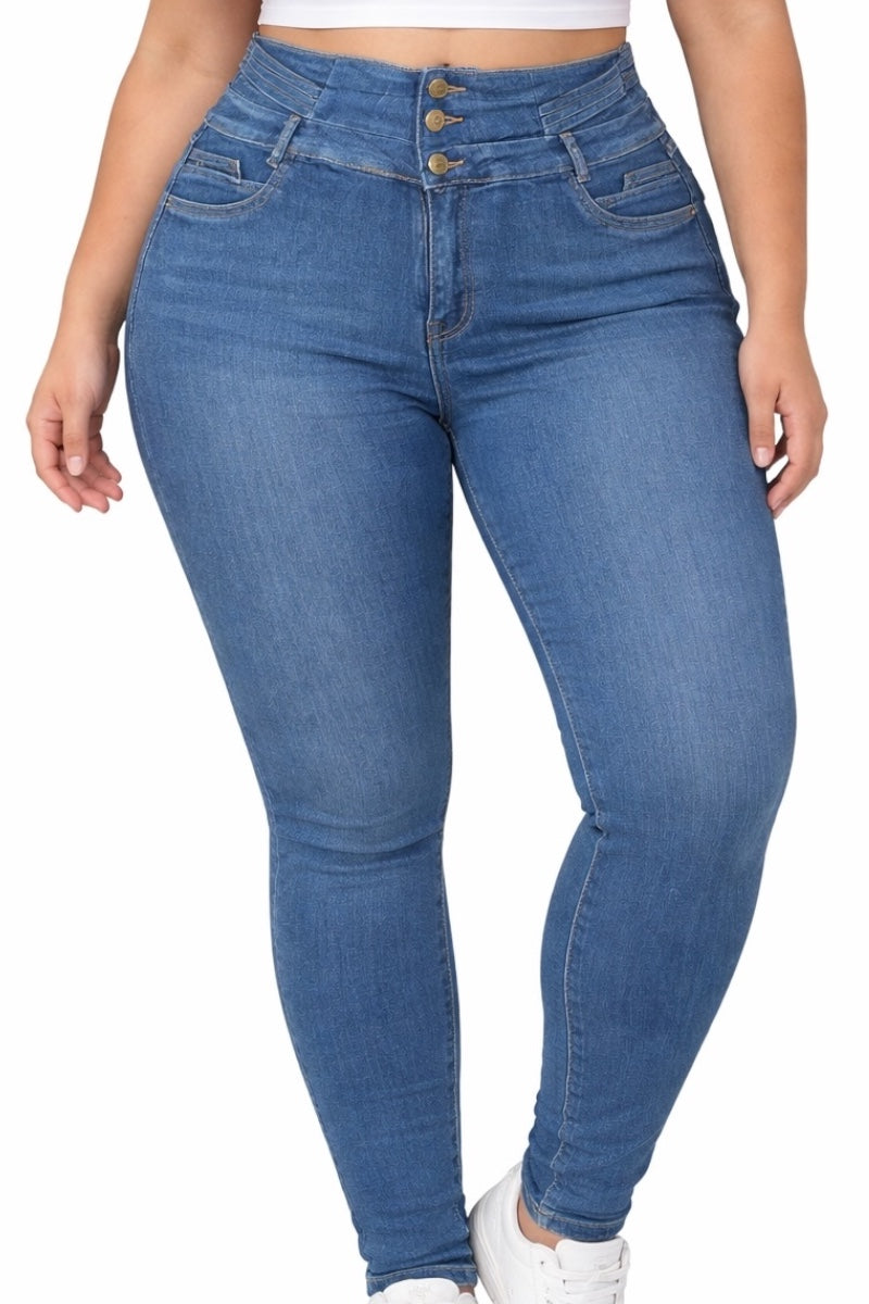 Blue jeans worn by a person on a white background