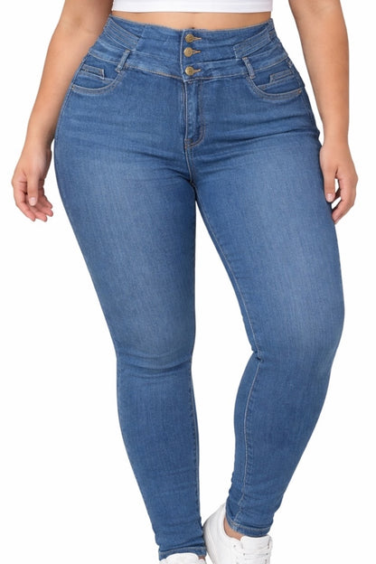 Blue jeans worn by a person on a white background