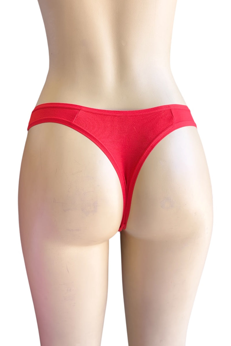 Red underwear on a mannequin against a white background
