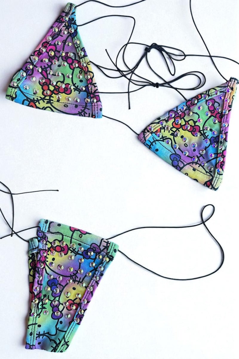 Colorful bikini set with cartoon character design on a white background