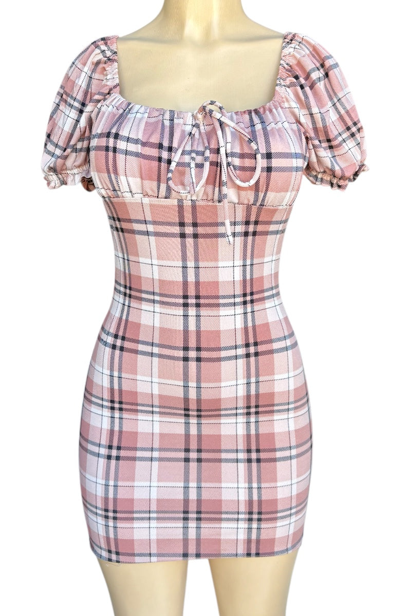 Plaid dress on a mannequin with a white background