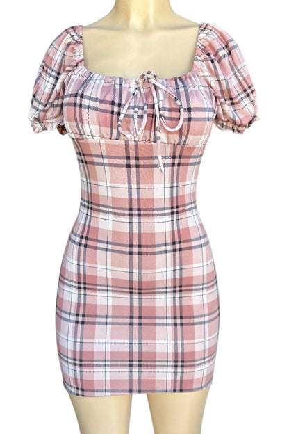 Plaid dress on a mannequin with a white background