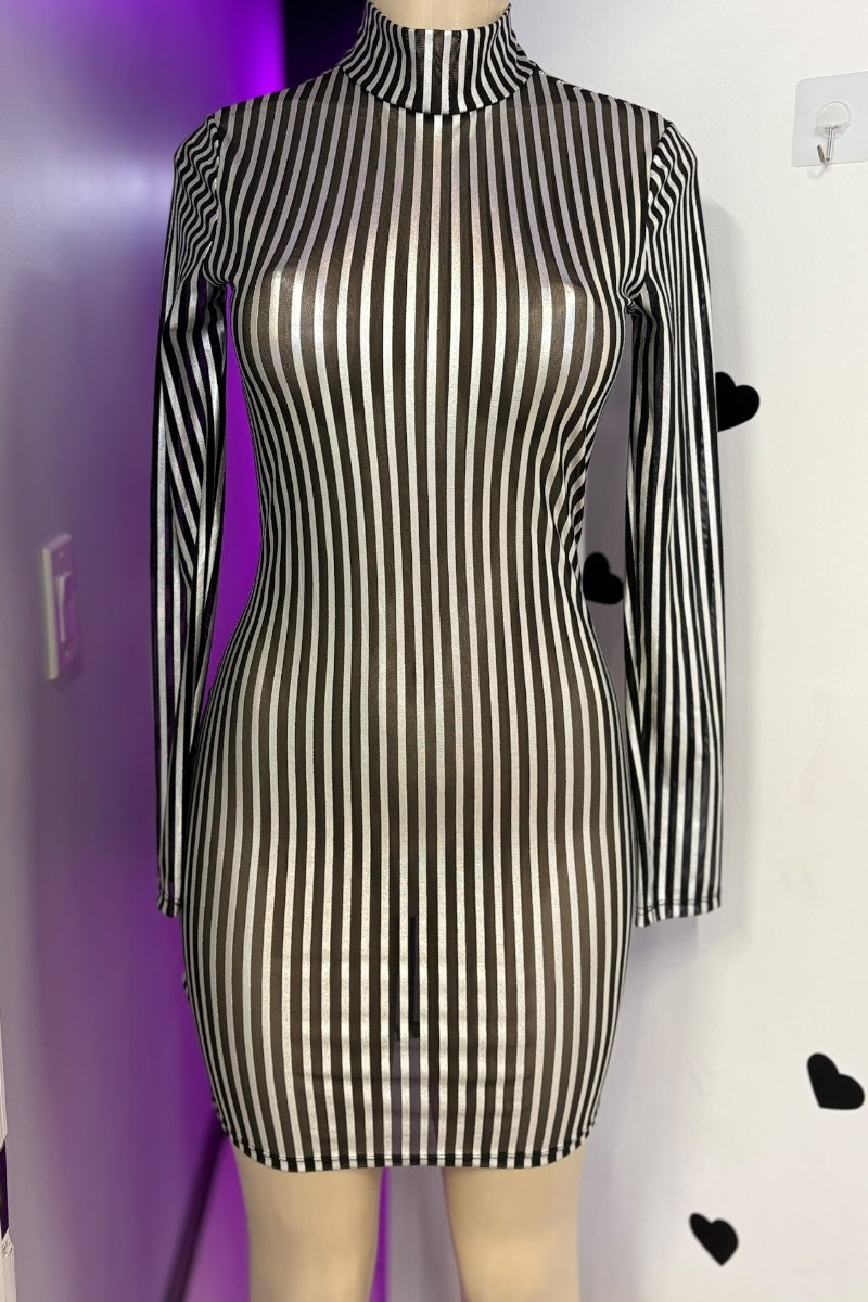 Black and silver striped dress on a mannequin against a white background