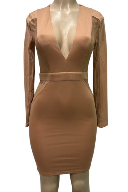 beige dress with sheer sleeves on a mannequin against a white background