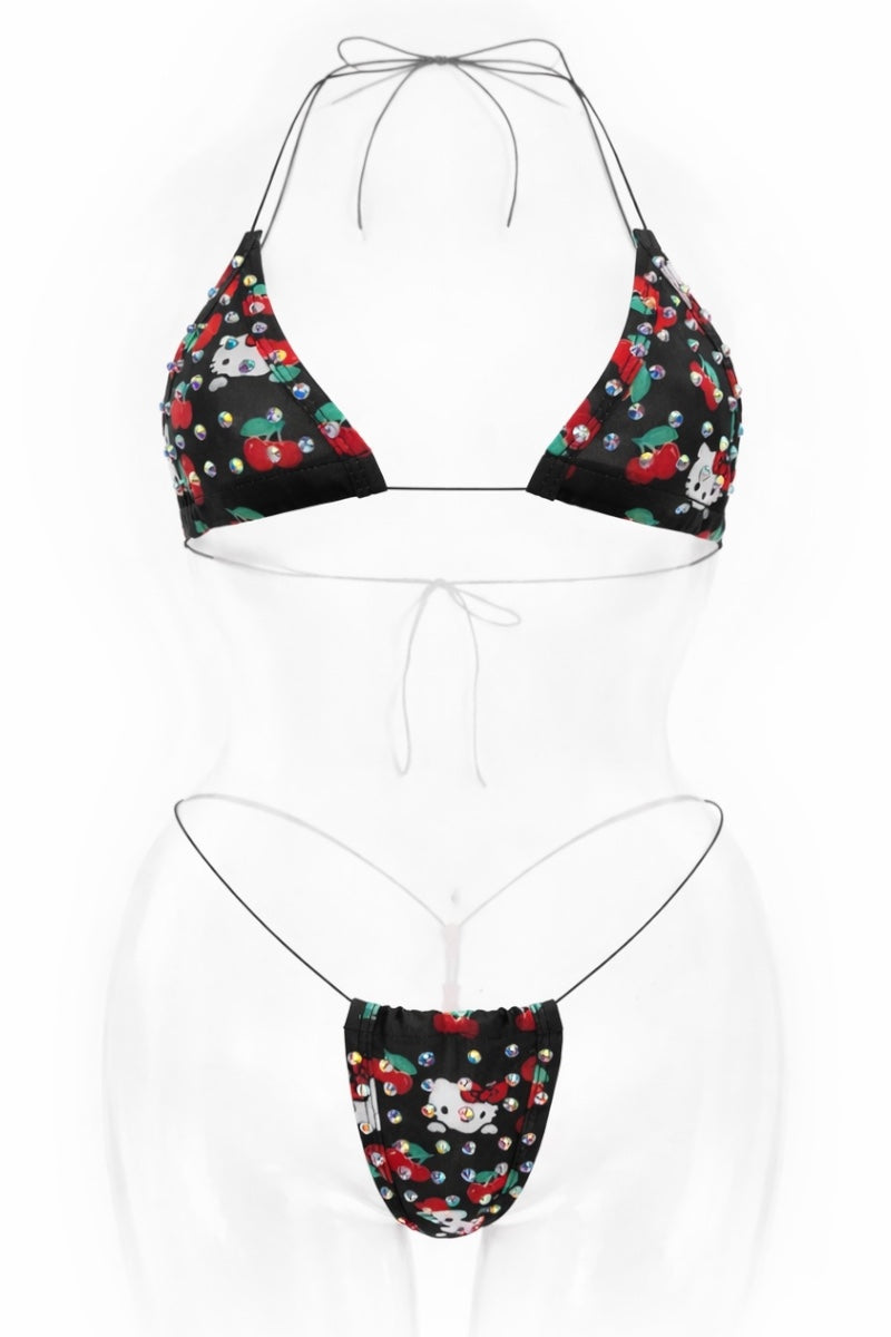 Black bikini set with colorful floral pattern on a white background