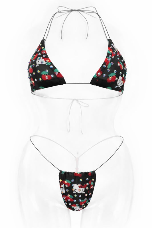 Black bikini set with colorful floral pattern on a white background