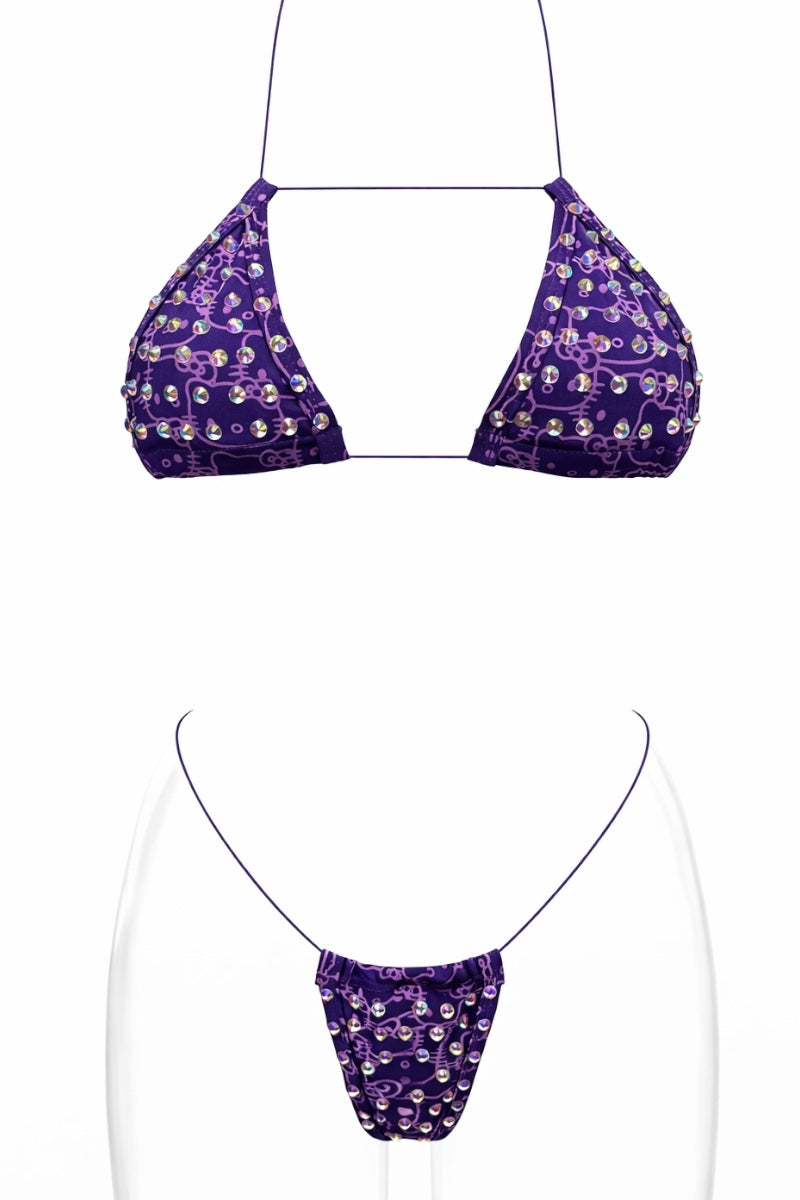 Purple bikini set with kitty pattern on a white background
