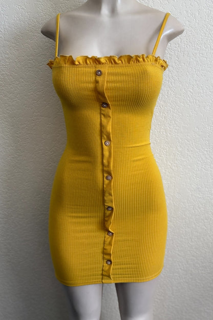 Mustard dress on a mannequin against a white background