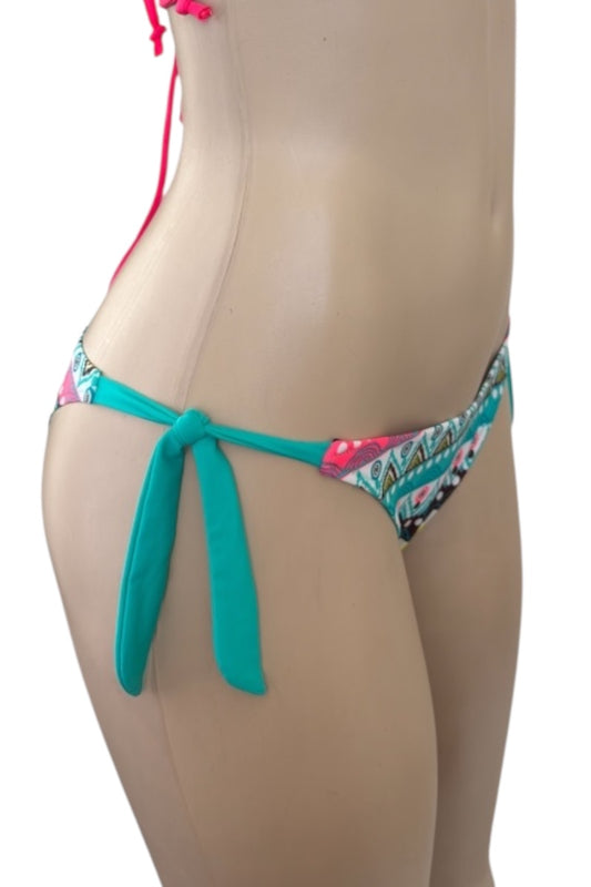 Teal bikini bottom with colorful floral pattern on a mannequin against a white background