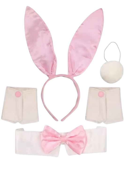 Set of pink bunny ears, bow tie, tail, and handcuffs on a white background