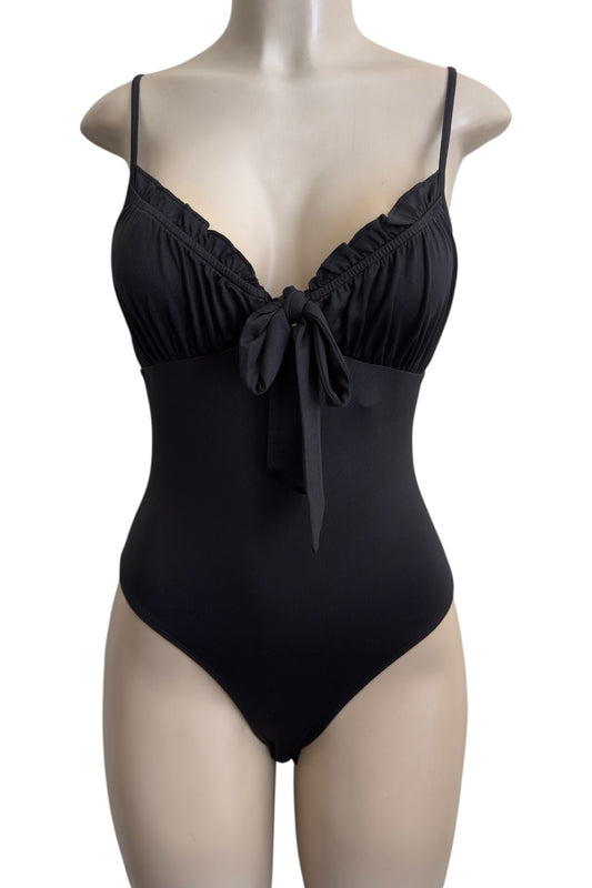 Black bodysuit on a mannequin against a white background