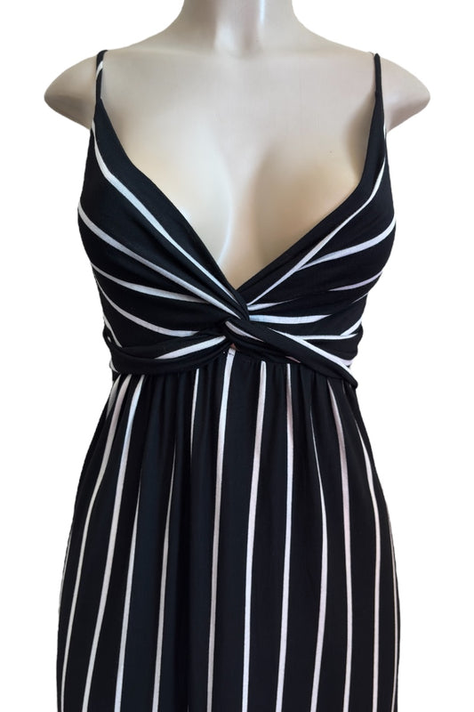 Black and white striped dress on a mannequin against a white background