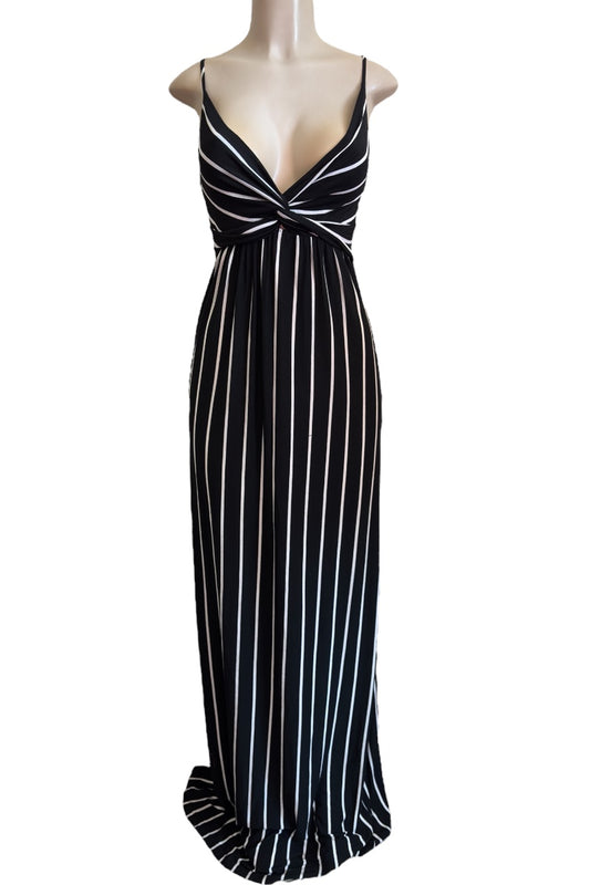Black and white striped dress on a mannequin against a white background