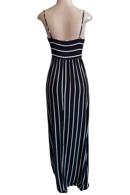 Black and white striped dress on a mannequin against a white background