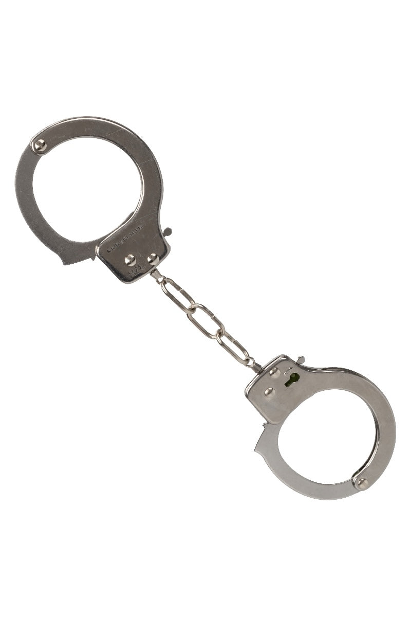 Metallic handcuffs on a white background