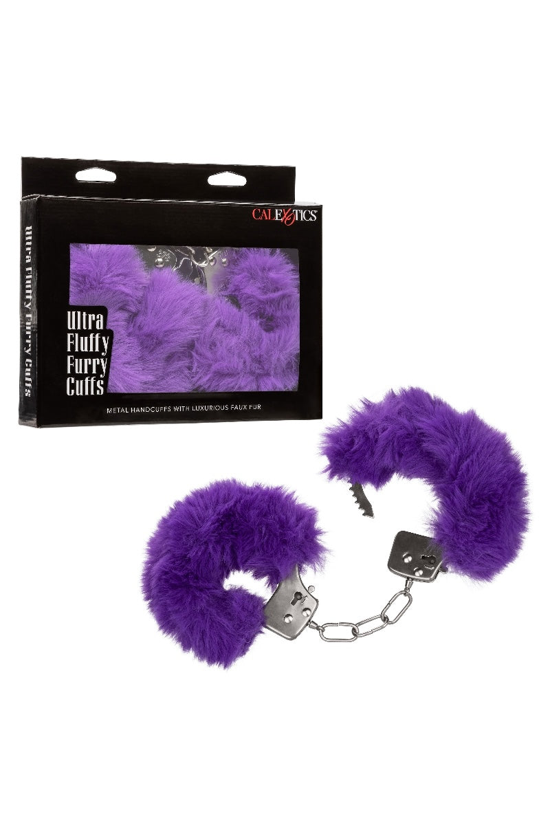 Purple fluffy handcuffs with packaging on a white background