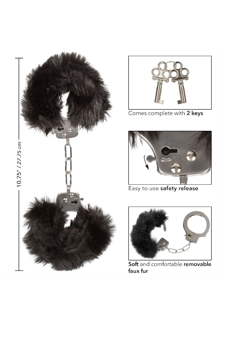 Black furry handcuffs with keys and safety release mechanism on a white background