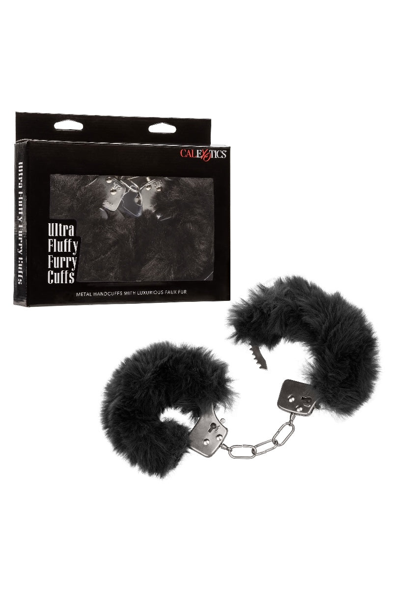 Black furry handcuffs with packaging labeled 'Calexotics' on a white background