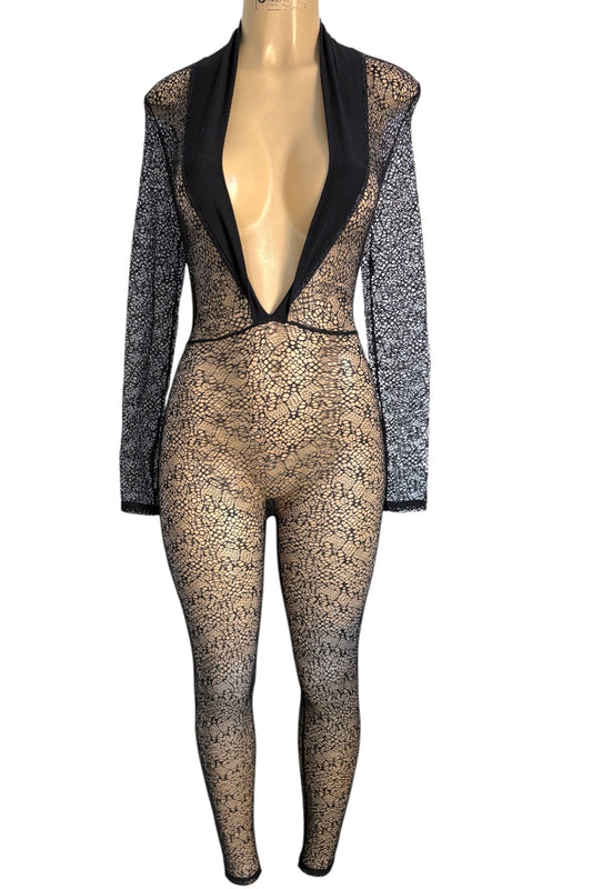 Mannequin wearing a black lace jumpsuit on a white background
