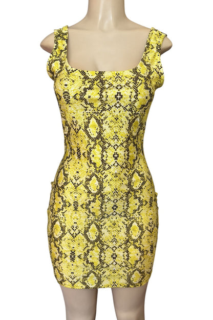 Yellow snake print dress on a mannequin against a white background