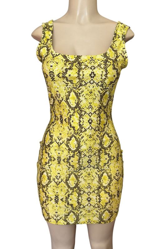 Yellow snake print dress on a mannequin against a white background