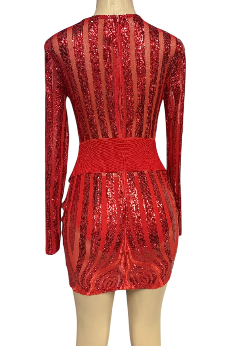 Red sequin dress on a mannequin against a white background