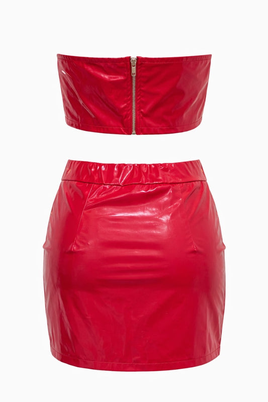Red vinyl top and skirt set on a white background
